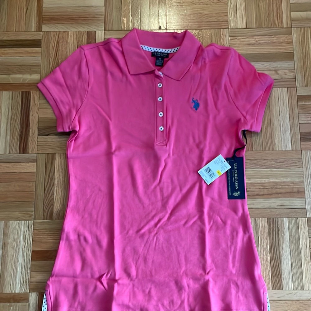 Brand New Women’s Polo Shirt, medium. Pink with blue logo.